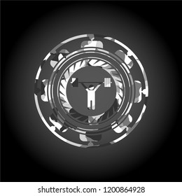 weightlifting icon inside grey camo emblem