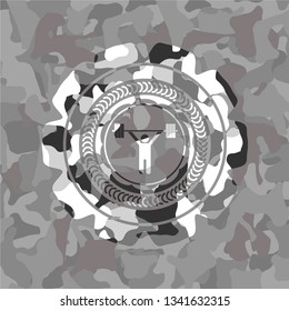 weightlifting icon inside grey camo texture