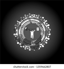 weightlifting icon inside grey camo emblem