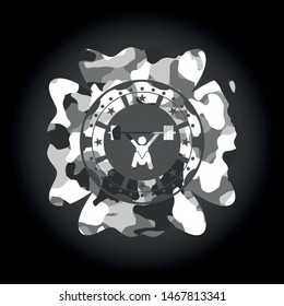 weightlifting icon inside grey camouflage texture