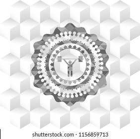 weightlifting icon inside grey emblem with geometric cube white background