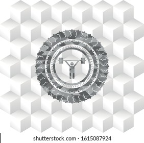 weightlifting icon inside grey emblem with cube white background