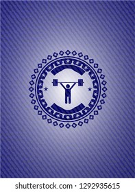 weightlifting icon inside jean or denim emblem or badge background