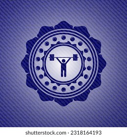 weightlifting icon inside jean or denim emblem or badge background. 