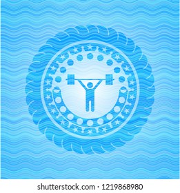weightlifting icon inside light blue water emblem.