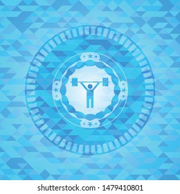 weightlifting icon inside light blue emblem with mosaic ecological style background