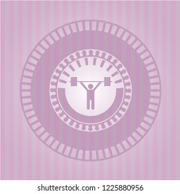 weightlifting icon inside pink emblem