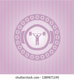 weightlifting icon inside pink emblem
