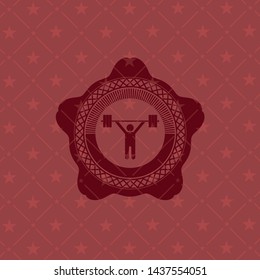 weightlifting icon inside red icon or emblem