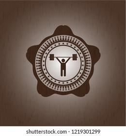 weightlifting icon inside retro style wood emblem