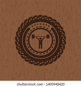 weightlifting icon inside retro style wooden emblem