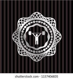 weightlifting icon inside silver badge