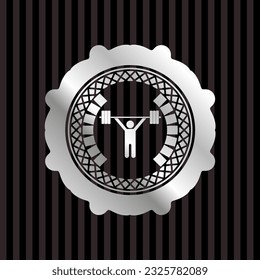 icono de levantamiento de pesas dentro de la placa de plata. 