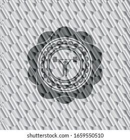 weightlifting icon inside silver emblem or badge. Scales pattern. Vector Illustration. Detailed.