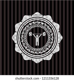 weightlifting icon inside silvery badge