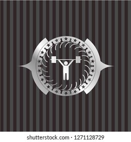 weightlifting icon inside silvery badge