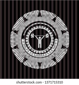 weightlifting icon inside silvery emblem