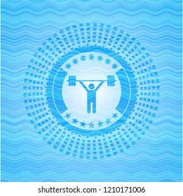weightlifting icon inside sky blue water badge background.