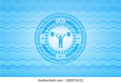 weightlifting icon inside sky blue water wave badge.
