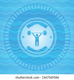 weightlifting icon inside water concept style emblem.