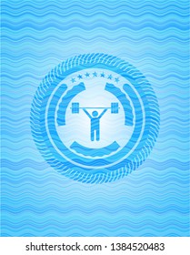 weightlifting icon inside water wave concept badge background.