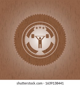 weightlifting icon inside wooden signboards