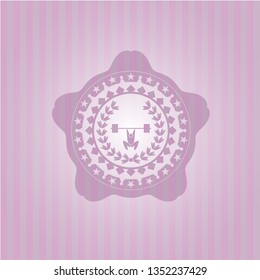weightlifting inside of crown icon inside badge with pink background