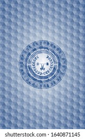 weightlifting inside of crown icon inside blue badge with geometric pattern.