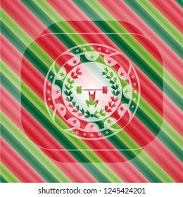 weightlifting inside of crown icon inside christmas style emblem.