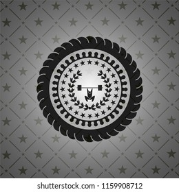 weightlifting inside of crown icon inside dark badge