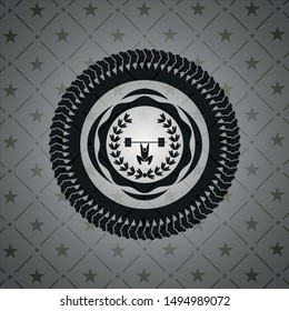 weightlifting inside of crown icon inside dark badge