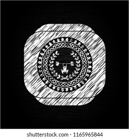 weightlifting inside of crown icon drawn on a blackboard
