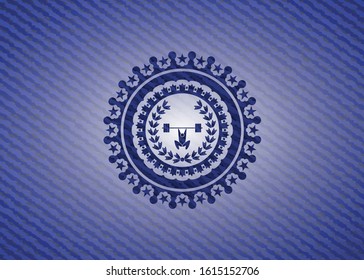 weightlifting inside of crown icon inside emblem with denim high quality background