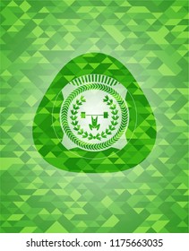 weightlifting inside of crown icon inside green emblem with mosaic ecological style background