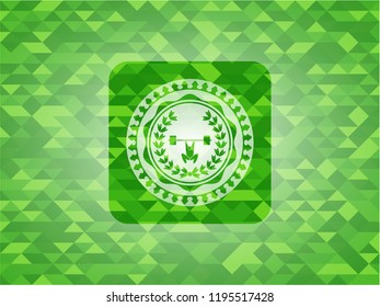 weightlifting inside of crown icon inside green mosaic emblem