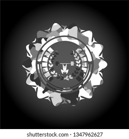 weightlifting inside of crown icon inside grey camouflaged emblem