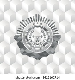 weightlifting inside of crown icon inside grey badge with geometric cube white background