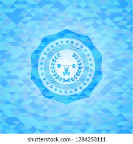 weightlifting inside of crown icon inside light blue emblem with mosaic background