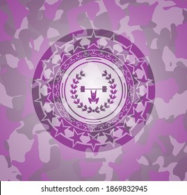 weightlifting inside of crown icon on pink and purple camouflage texture. 