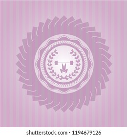 weightlifting inside of crown icon inside pink emblem. Retro