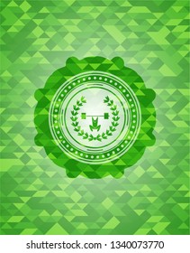 weightlifting inside of crown icon inside realistic green emblem. Mosaic background