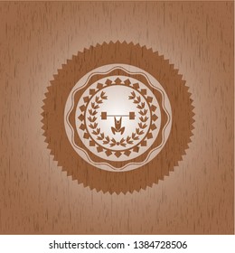 weightlifting inside of crown icon inside realistic wood emblem