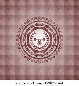 weightlifting inside of crown icon inside red seamless badge with geometric pattern.