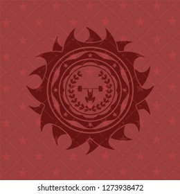 weightlifting inside of crown icon inside red emblem