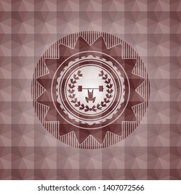 weightlifting inside of crown icon inside red seamless badge with geometric pattern background.