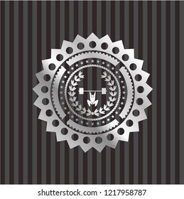 weightlifting inside of crown icon inside silver badge