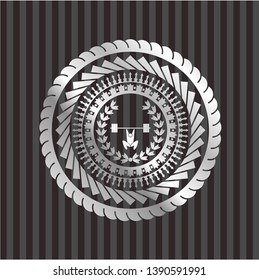 weightlifting inside of crown icon inside silver badge or emblem