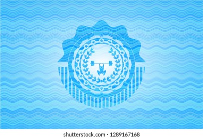 weightlifting inside of crown icon inside sky blue water wave badge background.