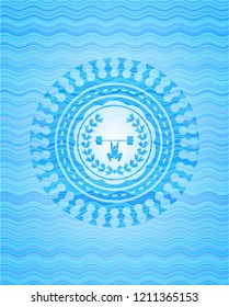 weightlifting inside of crown icon inside water representation badge.