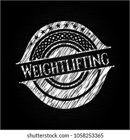 Weightlifting on blackboard